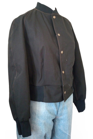 Front view of black ripstop bomber jacket with ribbed collar, cuff and hem.