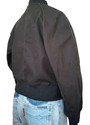 Back view of black ripstop bomber jacket with raglan sleeves