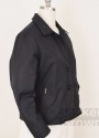 3/4 View of Bakker Brown waxed cotton jacket with 5 button front, collar and brown zipper pockets